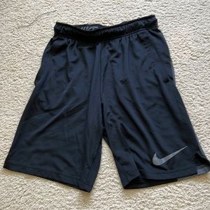 Black dri-fit athletic shorts.